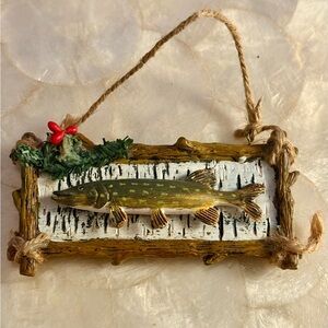 Small decorative northern pike fish ornament.